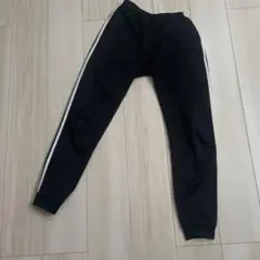 黒 スリムフィットパンツ 白ストライプ