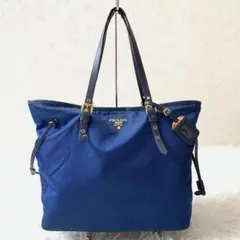 プラダ トートバッグ ロゴ 金具 ナイロン レザー ブルー 肩掛け チャーム付き