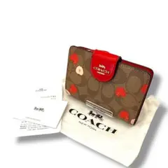 【良品】COACH コーチ 折り財布 PVC アップルプリント シグネチャー