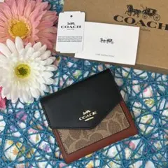 COACH 2つ折り財布 ブラック ブラウン シグネチャー