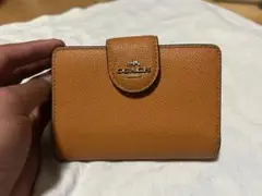 COACH オレンジ 二つ折り財布