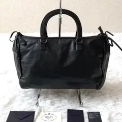プラダ ハンドバッグ ロゴ 型押し リボン レザー 黒 ブラック シルバー金具