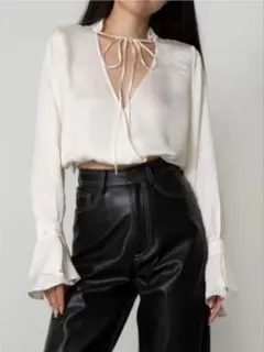 determ COLLAGEN SATIN RUFFLED BLOUSE
