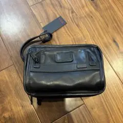 TUMI ブラックレザー クラッチバッグ　ギャランティカード付き　高島屋購入