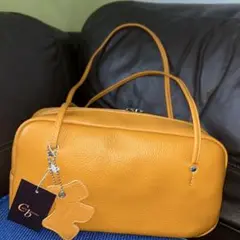新品　ショルダーバッグ マスタード 38850