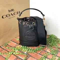 ≪新品≫COACH バケットバッグ ハンドバッグ ショルダー 丸ロゴ ブラック