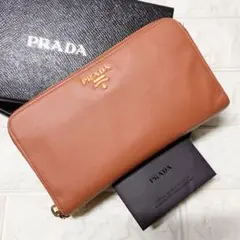 プラダ ラウンドジップ 長財布 オレンジ