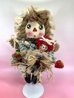 Country doll with her favorite doll