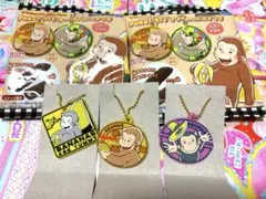おさるのジョージ Puku!ラバ クリームin スナックのランダムキーホルダー