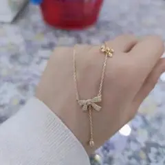 ♥️残りわずか♥️レディース　ネックレス　ゴールド　おしゃれ　人気　リボン　上品