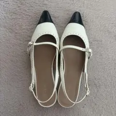 Herlipto Medallion Slingback Pumps
