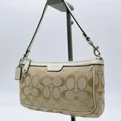 美品 COACH シグネチャー パーカーダッフル アクセサリーポーチe616