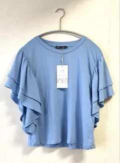 新品未着用【ZARA】ライトブルーフリル袖 Tシャツ Lサイズ