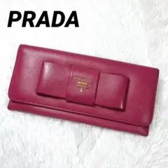 【美品✨ 】プラダ 長財布 リボン フラップ サフィアーノレザー ピンク 金ロゴ