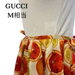 GUCCIグッチオレンジの模様フレアスカート100%シルク両脇でリボン結びM