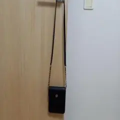 トリーバーチ　黒い合成皮革スマホショルダーストラップ