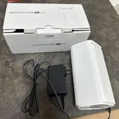 Speed Wi-Fi HOME 5G L12 本体と電源アダプター