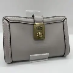 コーチ レザー 折り財布 ターンロック 金具 ハットン グレージュ