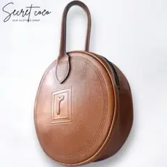 おすすめ レノマ オールレザー 円形 ラウンド ハンドバッグ ブラウン 茶