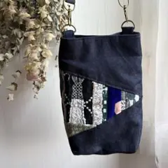 ハンドメイド　スマホポーチ　ミナペルホネンのハギレ利用
