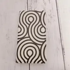 スマホケース うずまき 白黒 手帳型