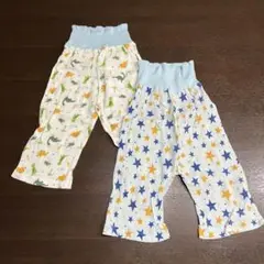 恐竜柄と星柄のベビーパジャマ（腹巻き付きステテコ）2枚組