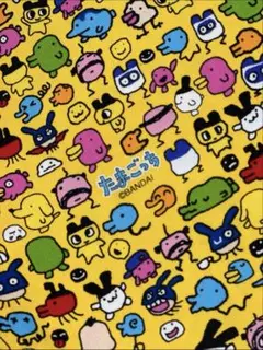 1068.たまごっち　オックス生地　はぎれ