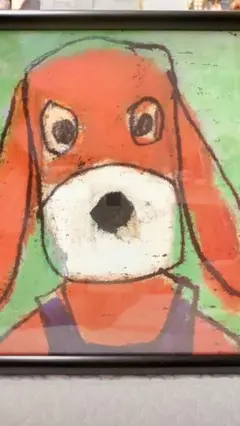 オレンジの犬の絵画 黒フレーム付き