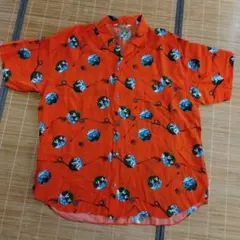 オレンジ色 半袖シャツ 風景プリント