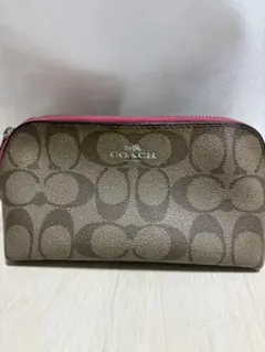 COACH コーチ　ポーチ　シグネチャー　コスメティックポーチ　ピンクライン
