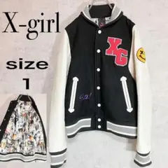 エックスガール スタジャン ブルゾン ジャケット ワッペン 総柄 レザー