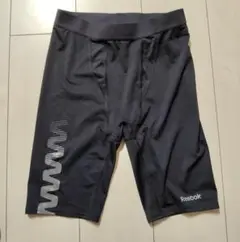 新品 サイズM リーボック ハーフスパッツ