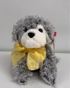 グレーのリボン付きぬいぐるみ犬