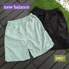 ニューバランスnewbalanceミントグリーン・ブラック 2枚組ショートパンツ