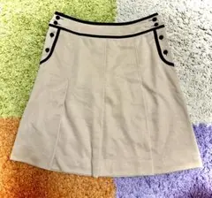impressiveベージュ Aライン ミニスカート ボタン付き