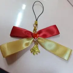 リボンストラップ 赤金 ハート 手のひら
