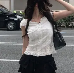 anyonemore レースフリルアイレットキャップスリーブブラウス