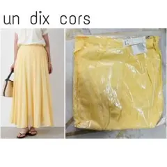 un dix cors ハイツイストシアーフレアスカート イエロー