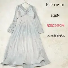 Her lip to Moon Glow Dot Pleated Dress
