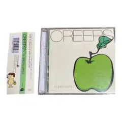 A GREEN APPLE  creeps