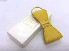 ✨美品✨ニナリッチ　キーホルダー　リボン　黄色　1326