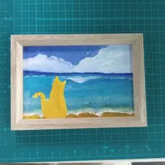 海を眺める猫の手描きイラスト（フレーム付き）