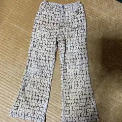 エーアーベー文字プリント ベージュ ロングパンツ