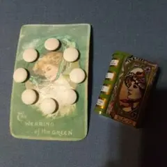 小さな小物缶ケースと白いボタンシート・メルスリー♪