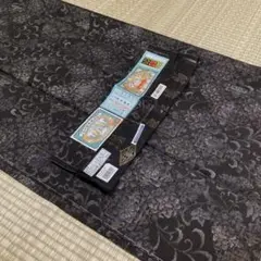 証紙あり 九マルキ 本場鹿児島県大島紬 純泥染【永長織物】《黒地 花唐草》
