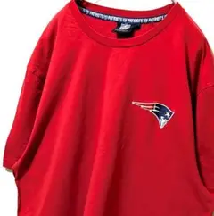 NFLニューイングランドペイトリオッツ ロゴ総柄 Tシャツレッド赤2XL古着