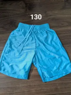 青いバスケットボールパンツ 130