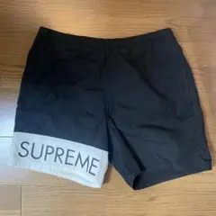 SUPREME Banner Water Short