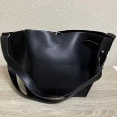 69 &MyuQ アンドミューク 黒のショルダーバッグ