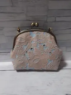 ①smile flower light blue ミナペルホネン がま口 ポーチ